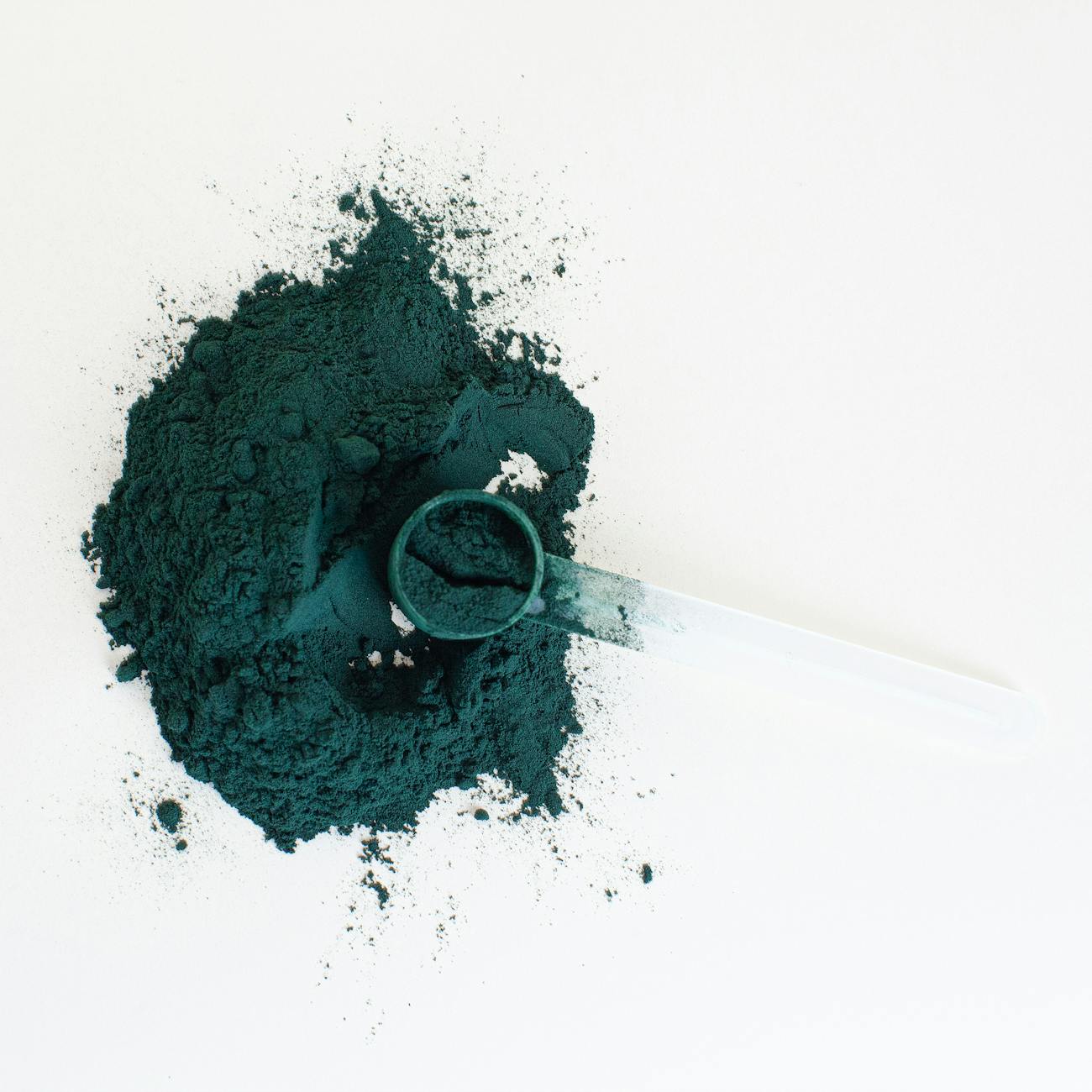 green powder on white table