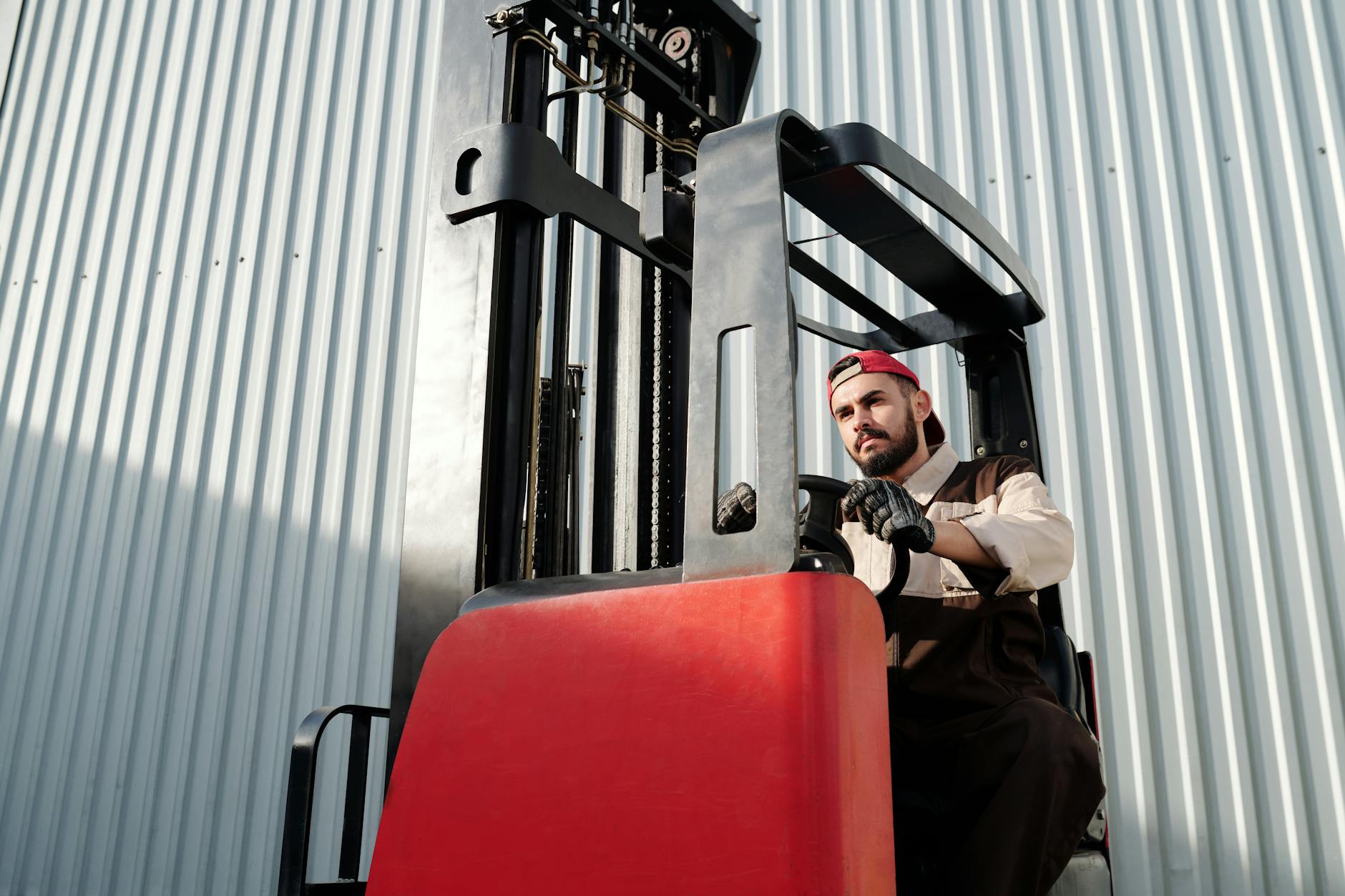 operator drives forklift