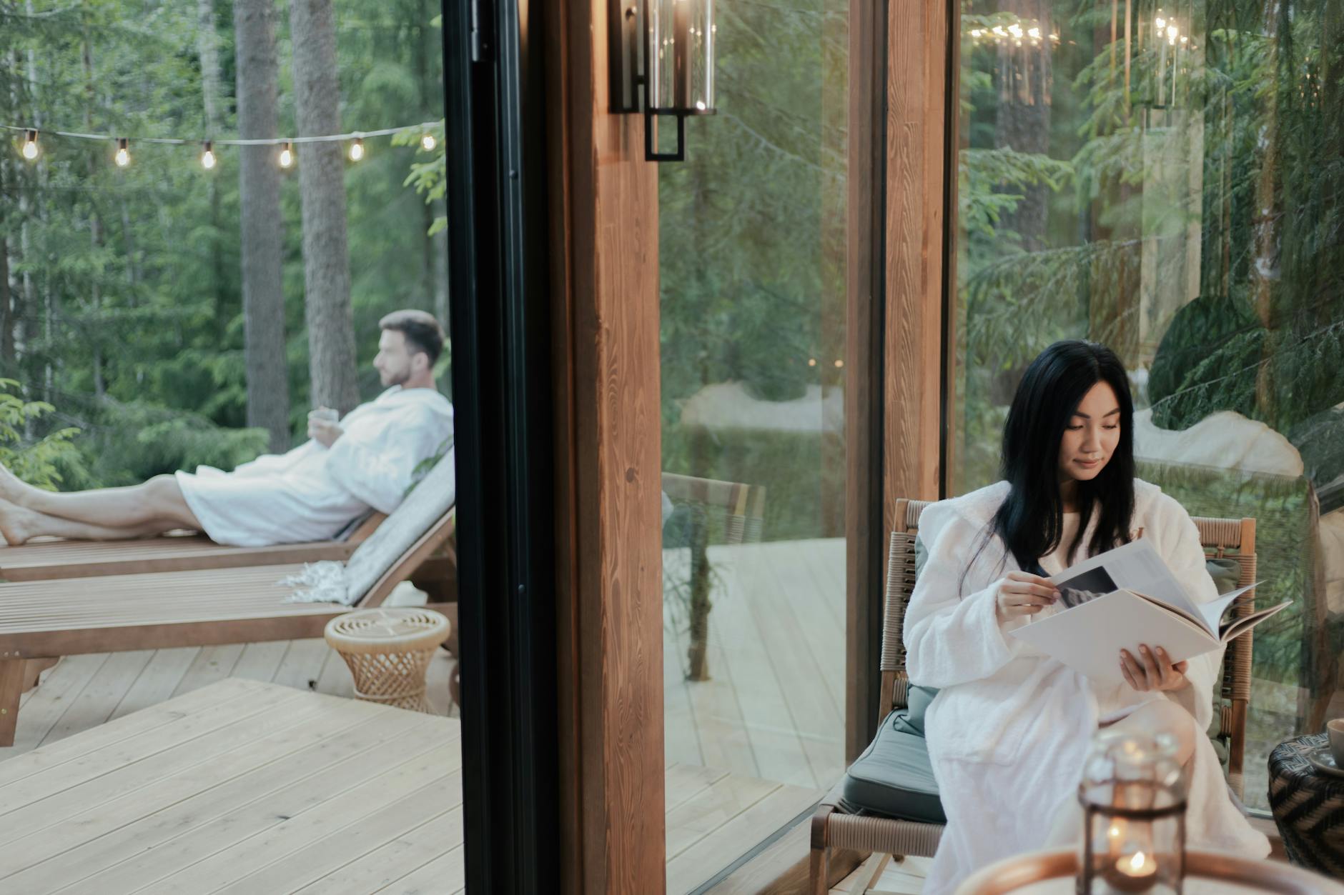 a woman reading the magazine