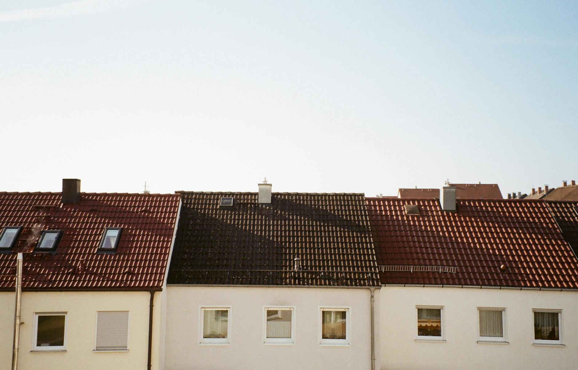 sunny day over residential rooftops