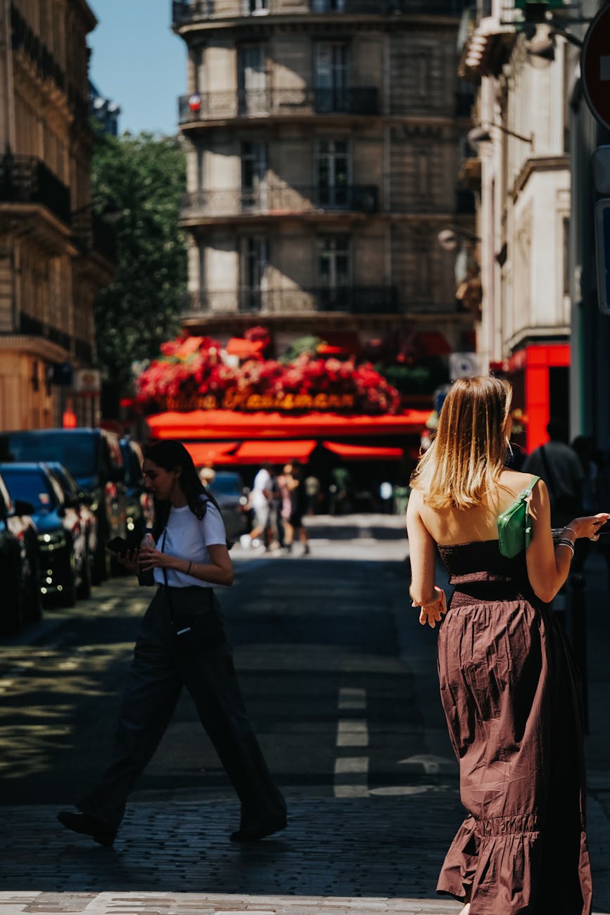 street scene in paris with people and flowers