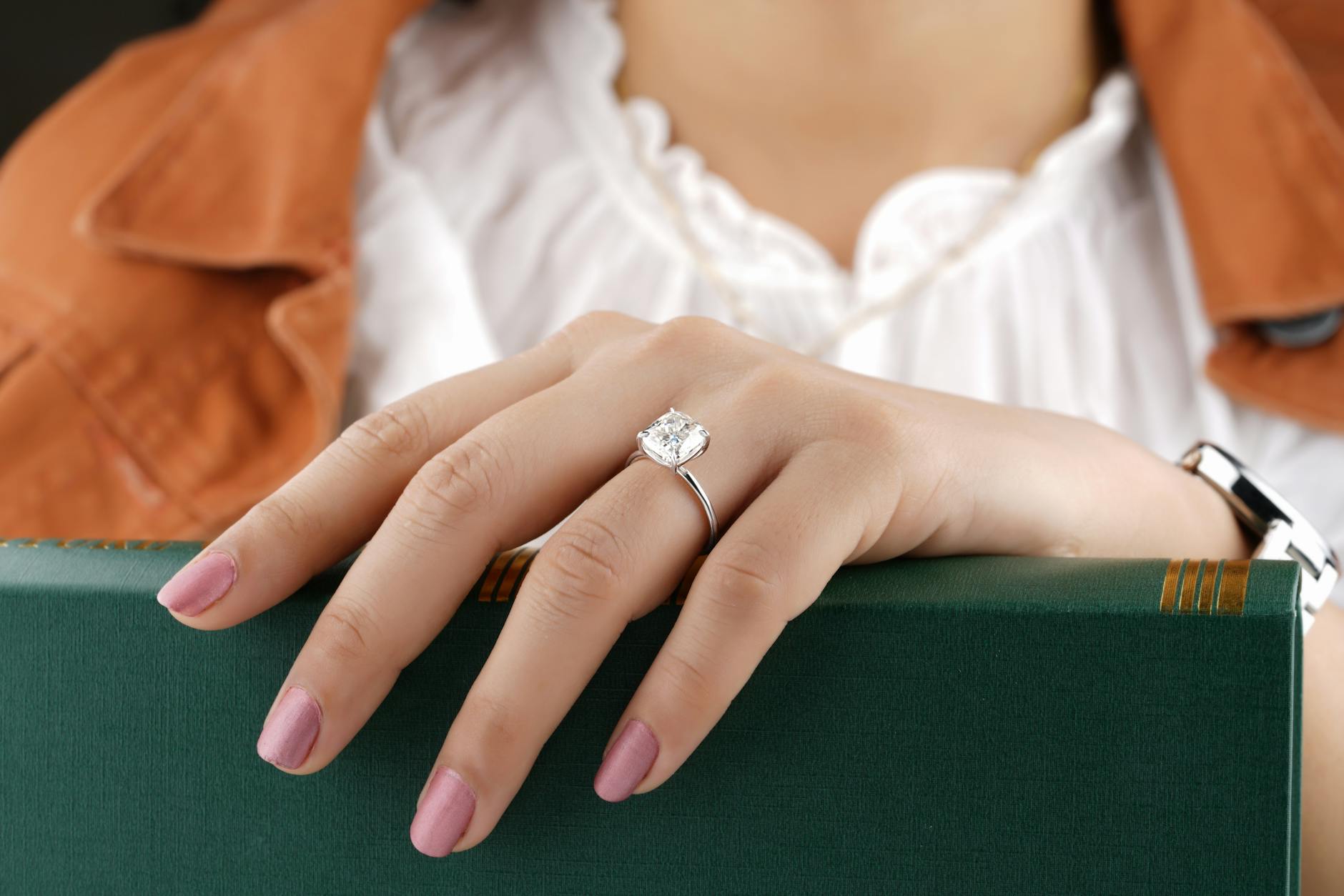 a close up on a ring on females hand
