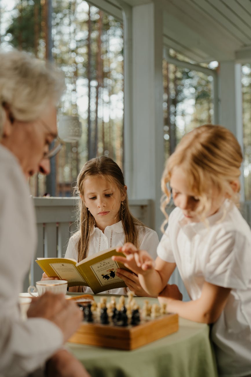 man playing chess with a child
