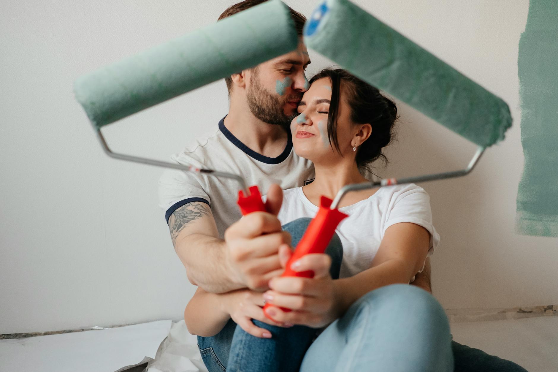 a man kissing a woman