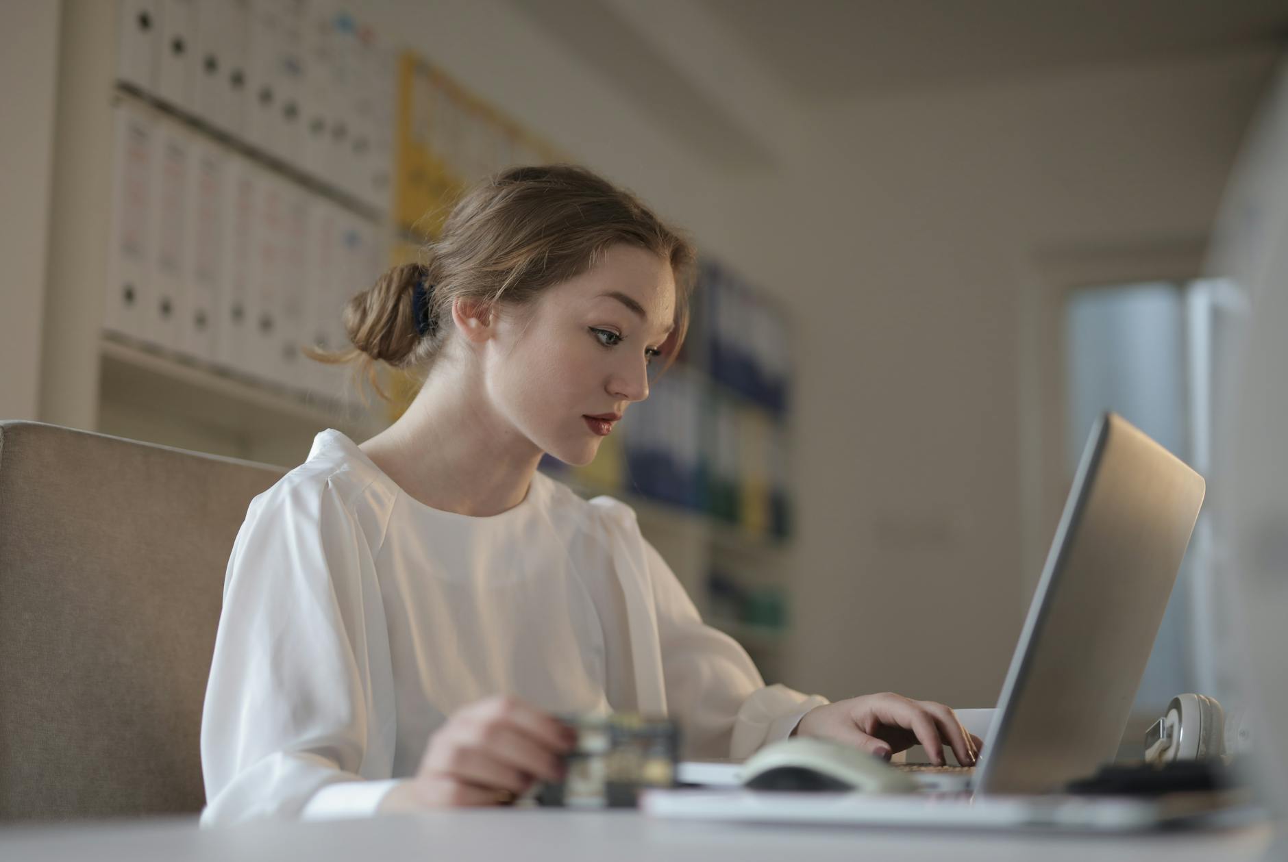 female accountant working using laptop