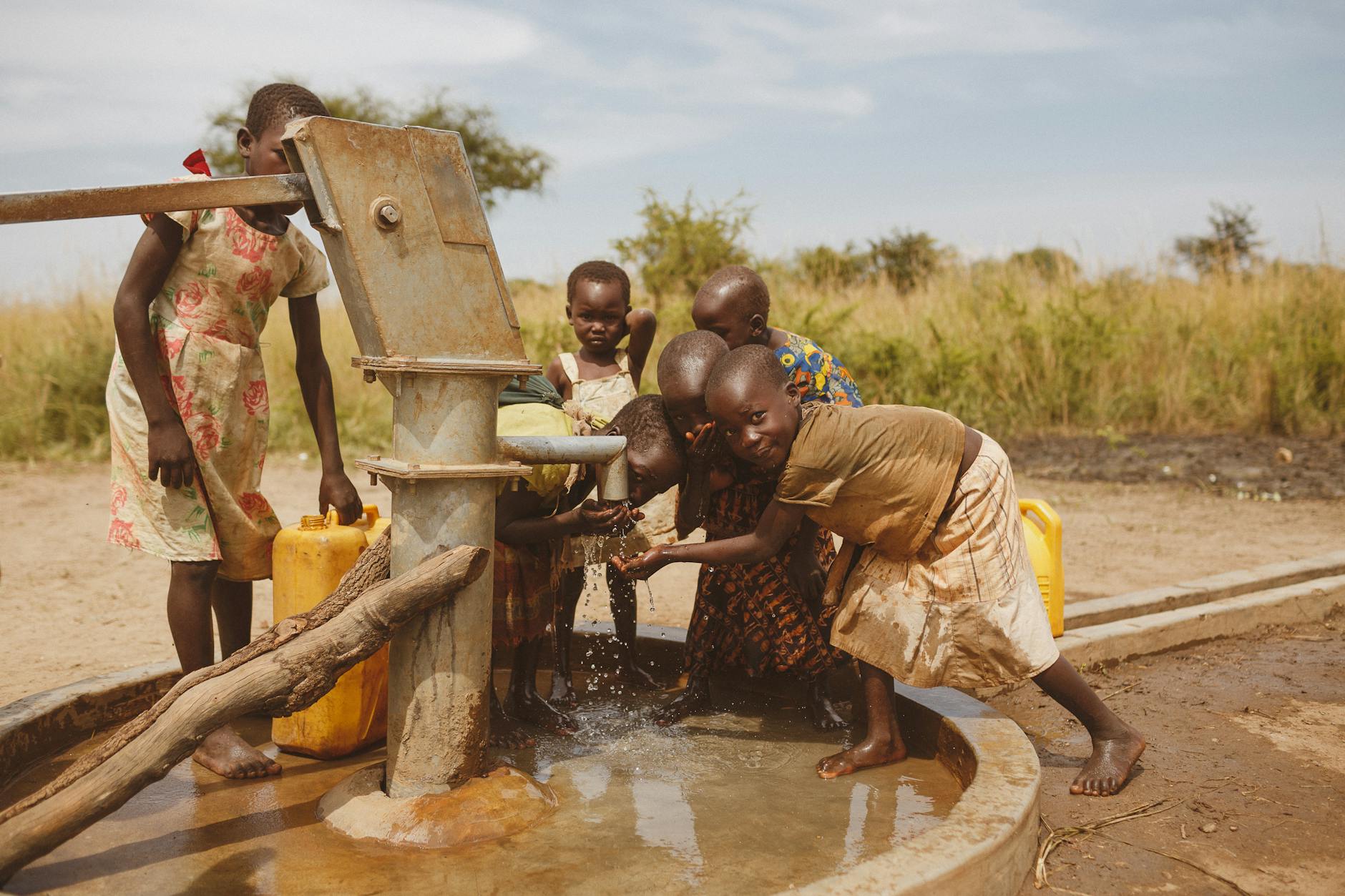 photo of children drinking water