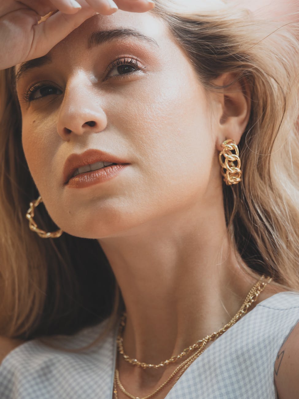 close up of a woman wearing earrings