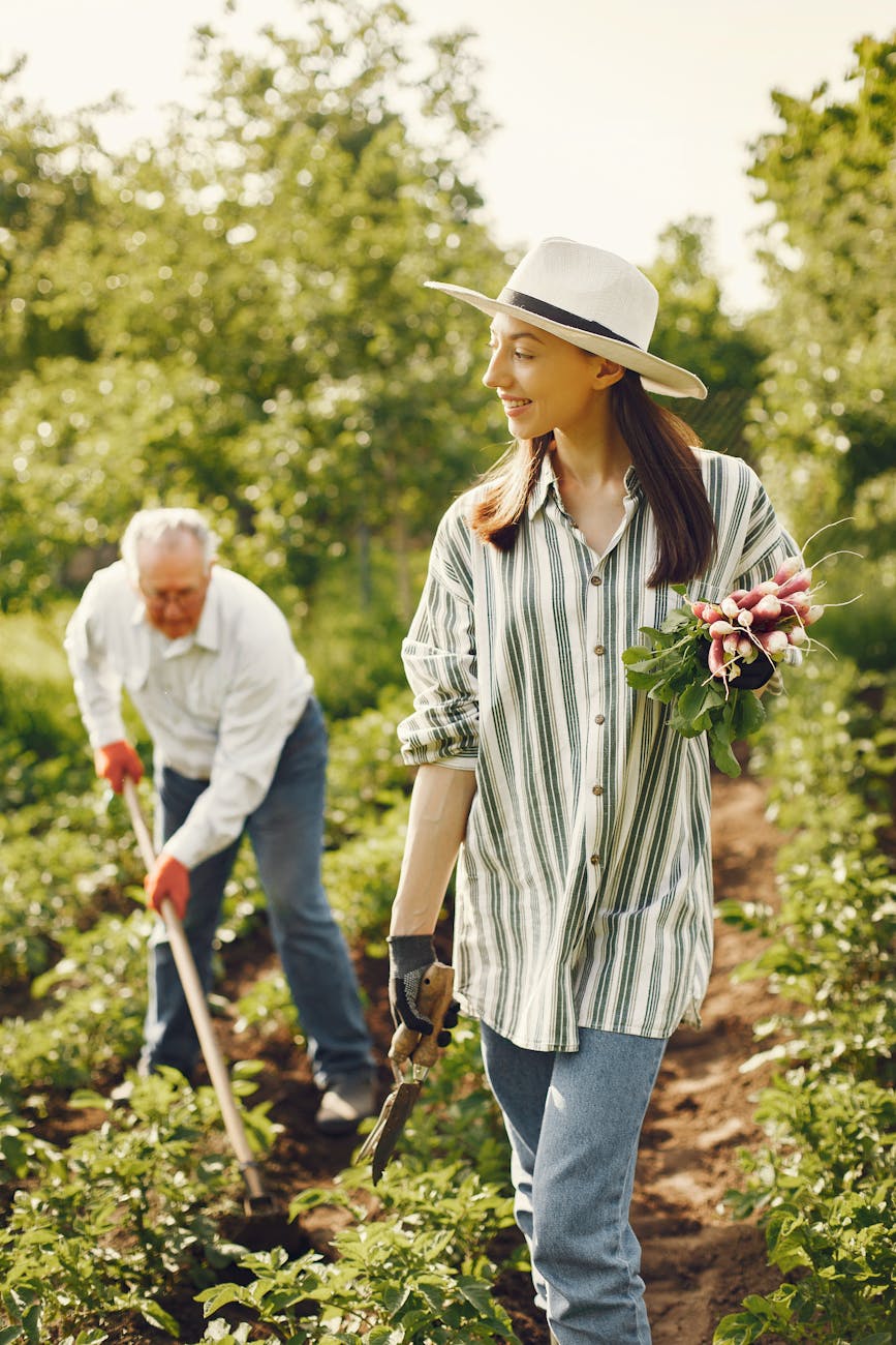 man and woman gardening