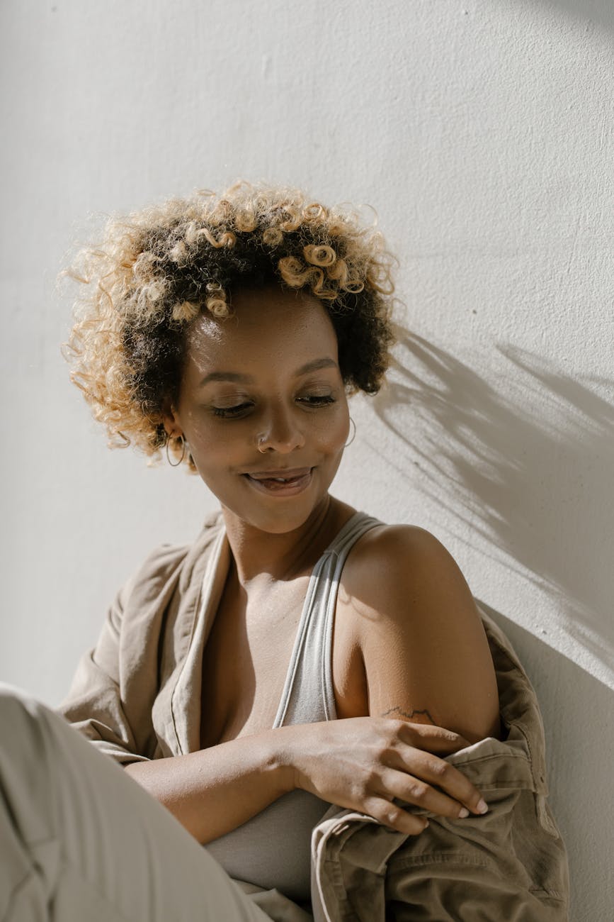 a woman wearing brown jacket