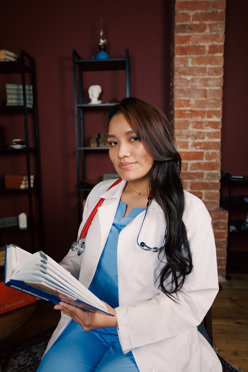 confident female doctor reading in study