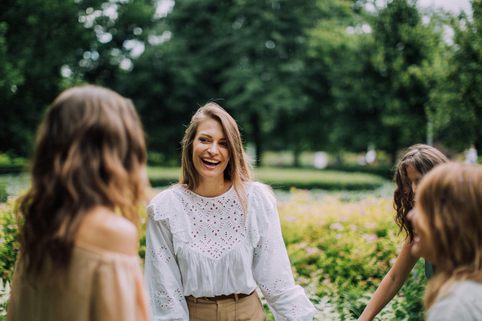 a happy woman at a park