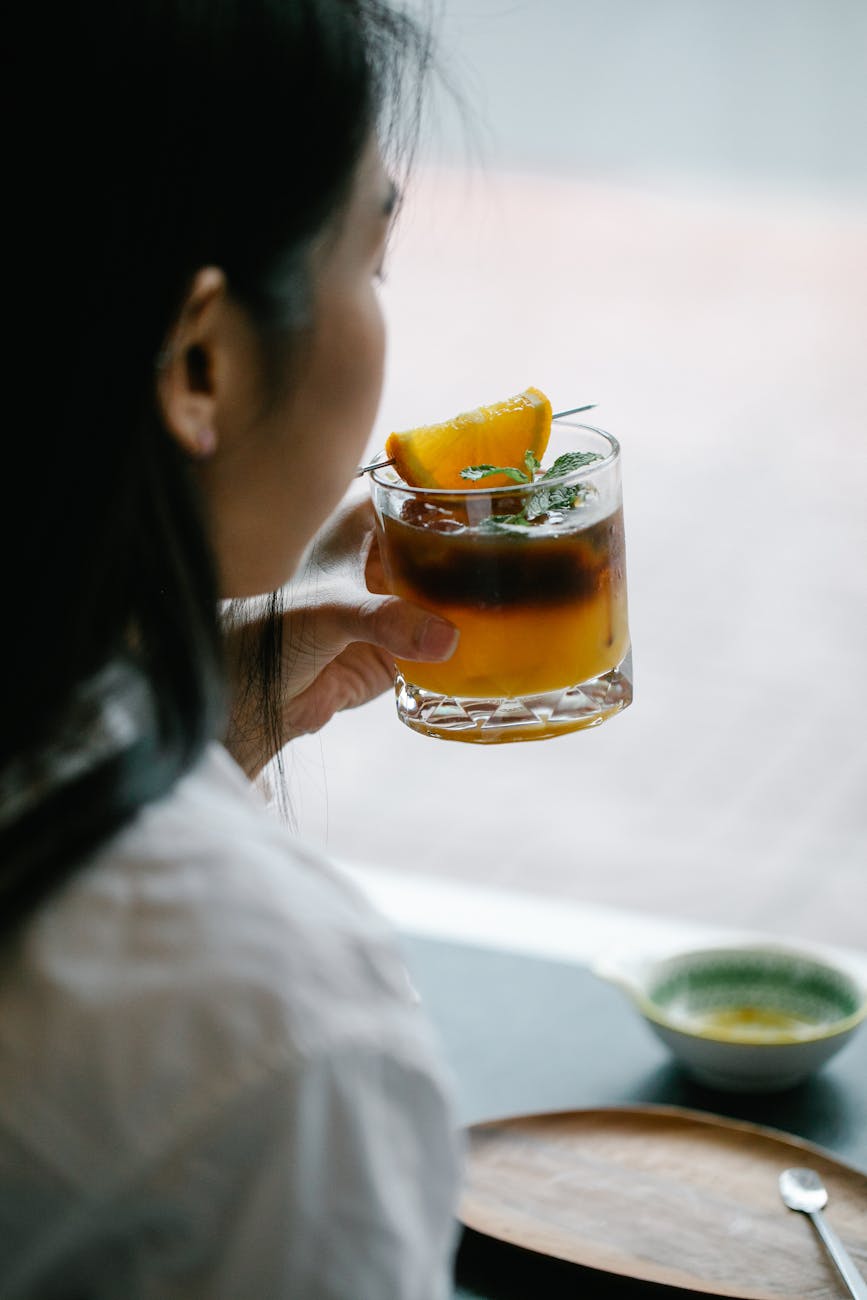 person holding a drink