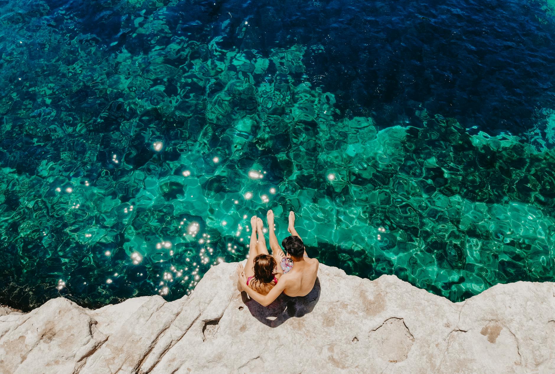 romantic couple enjoying ocean view in malta