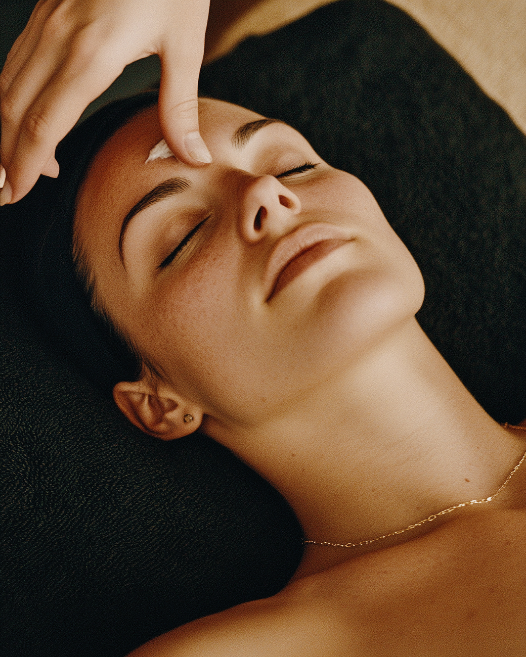 relaxing facial treatment in warm ambiance