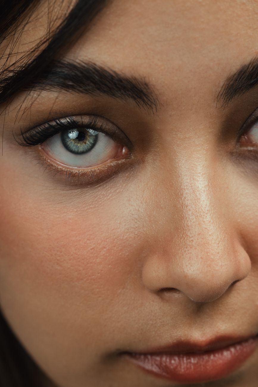 close up portrait of woman with blue eyes