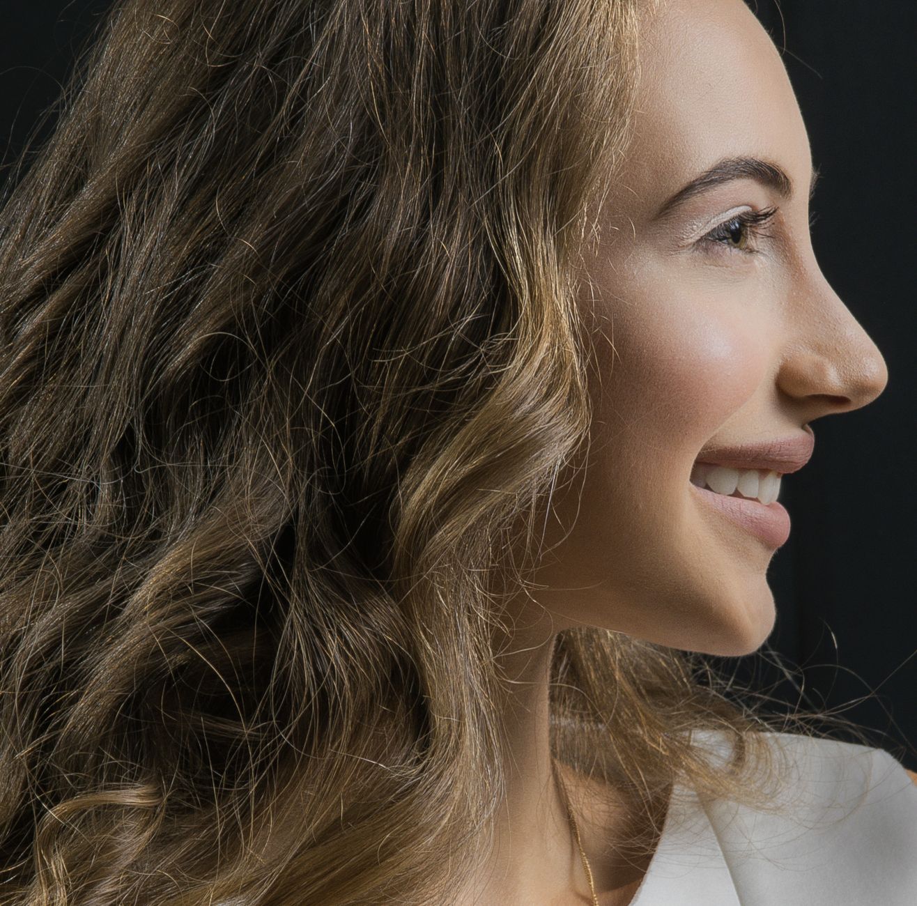 close up photo of a beautiful woman smiling