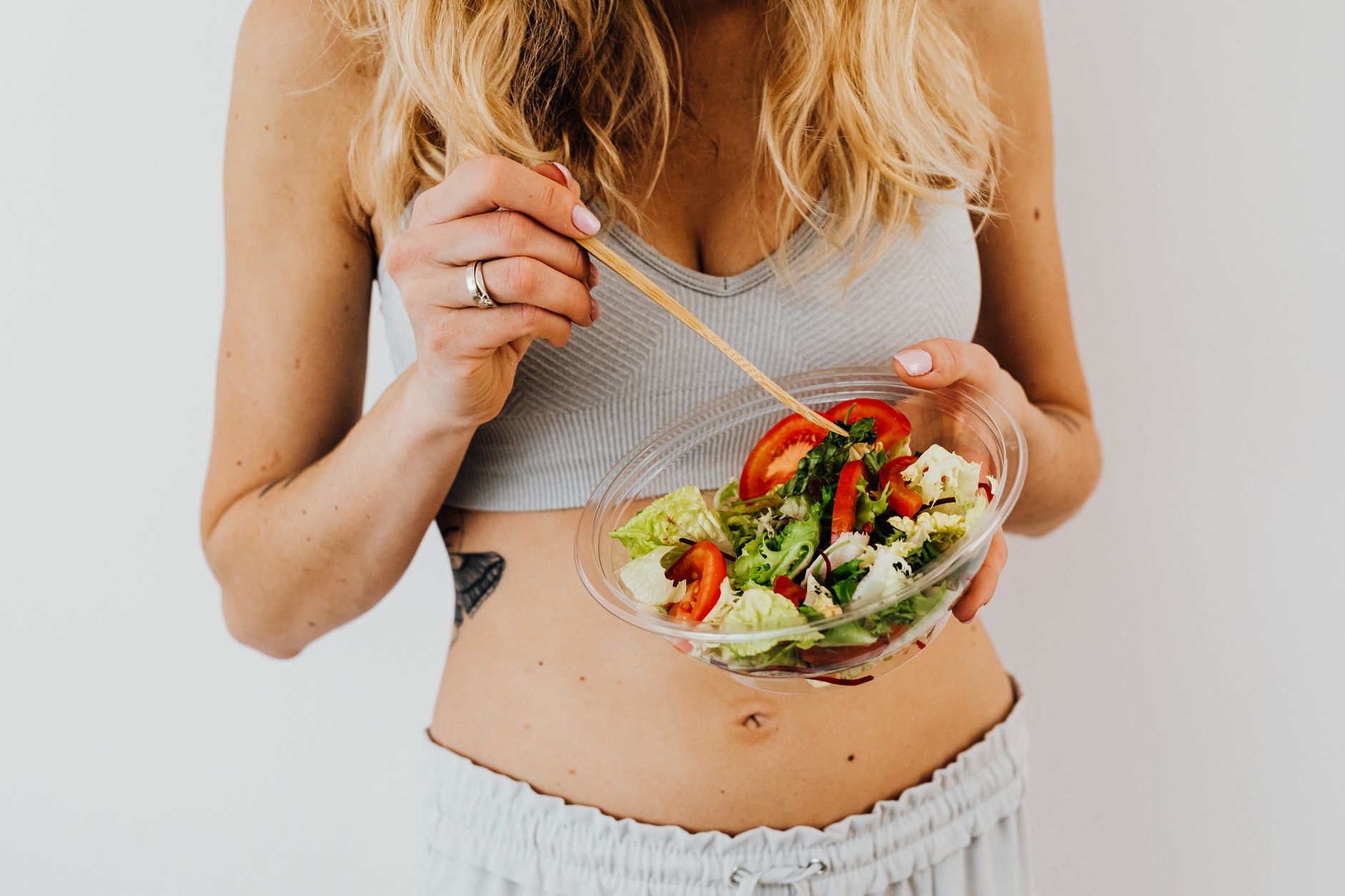 woman eating a salad