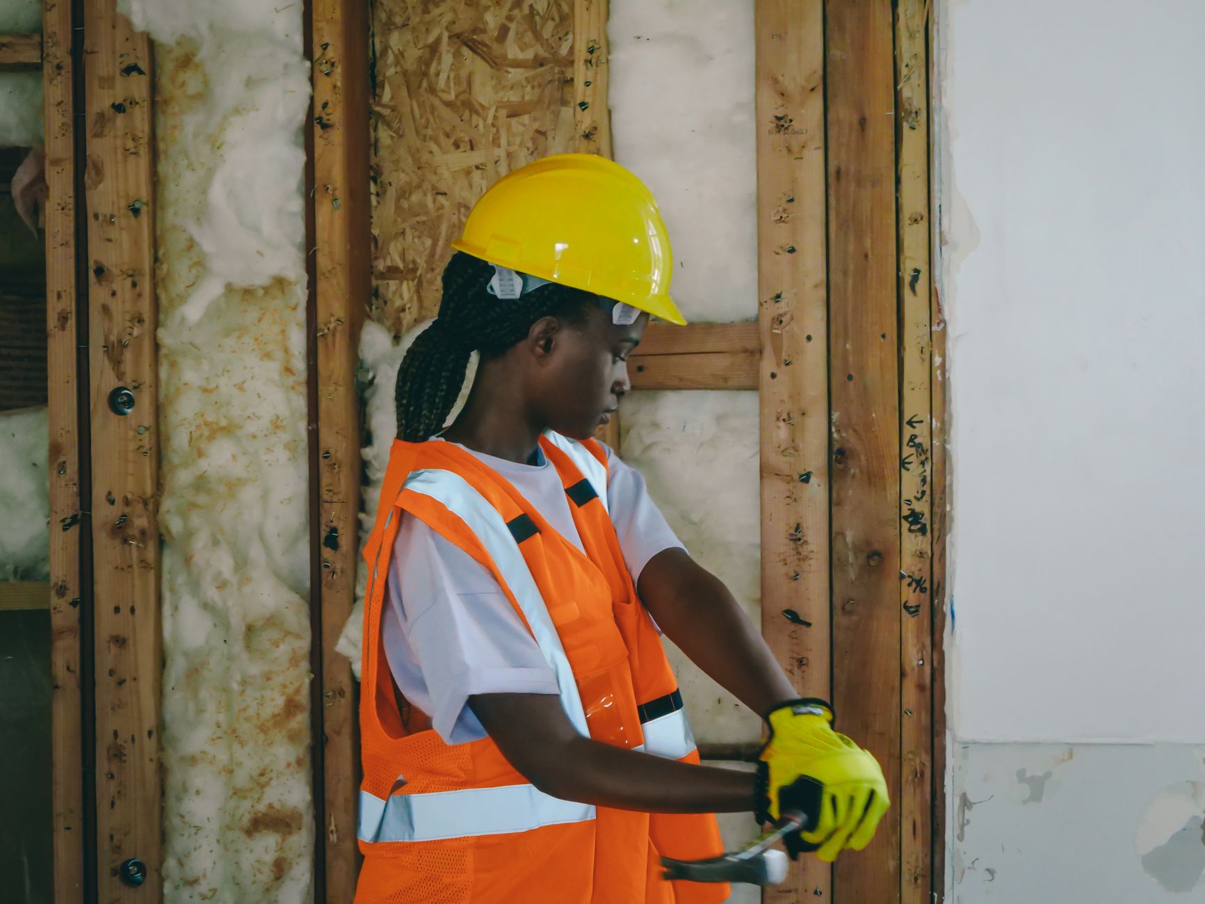woman in an orange reflective vest