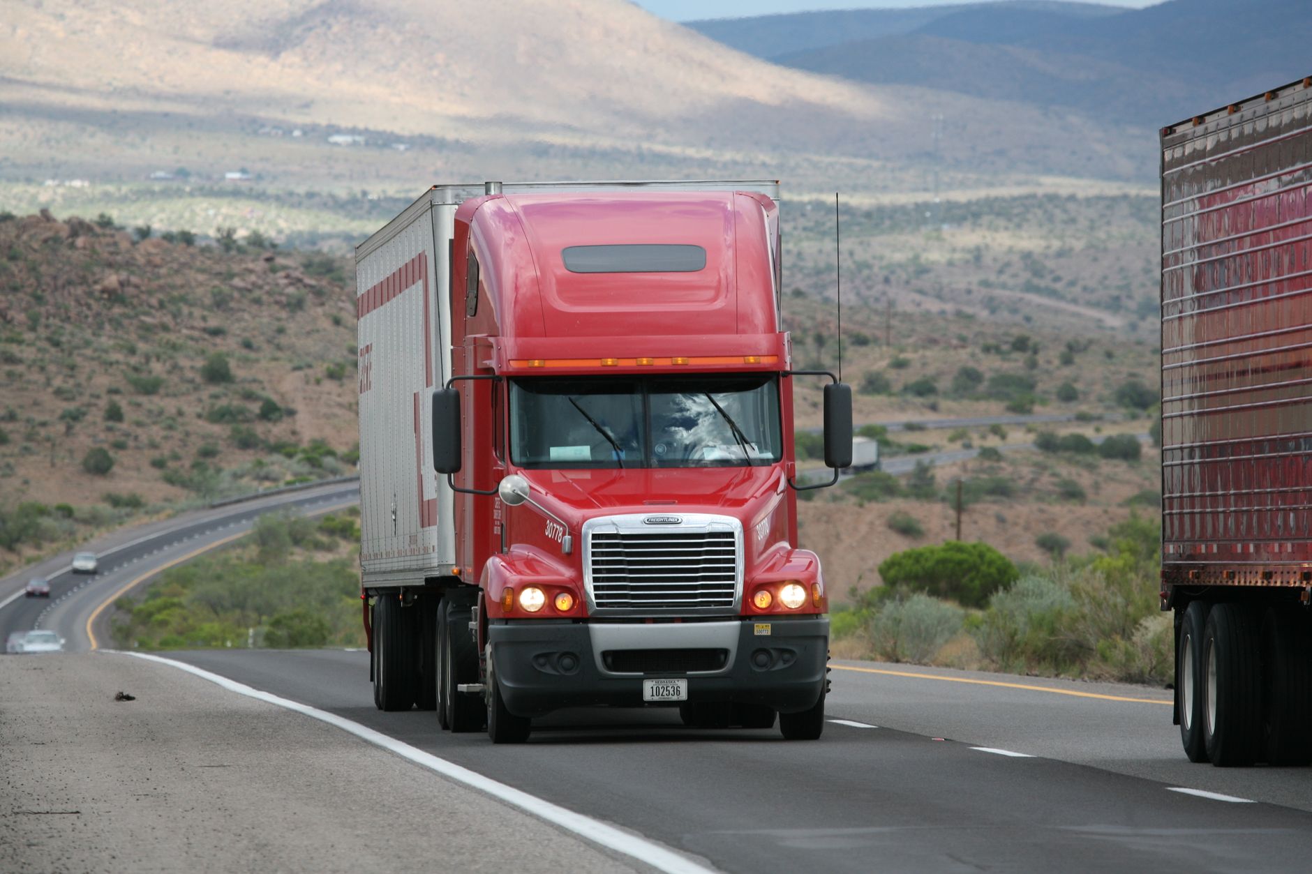red truck on the road