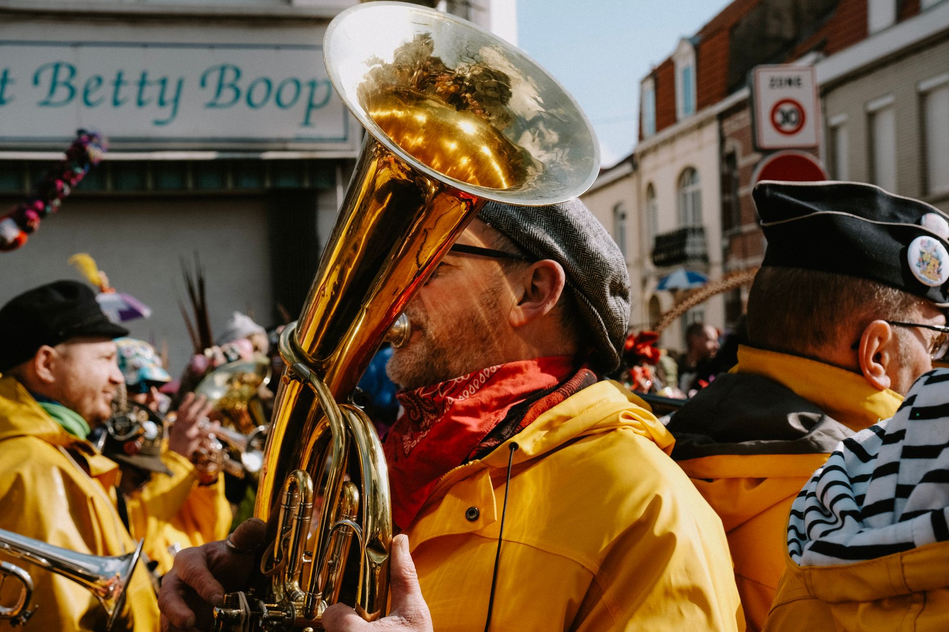 man playing a french horn