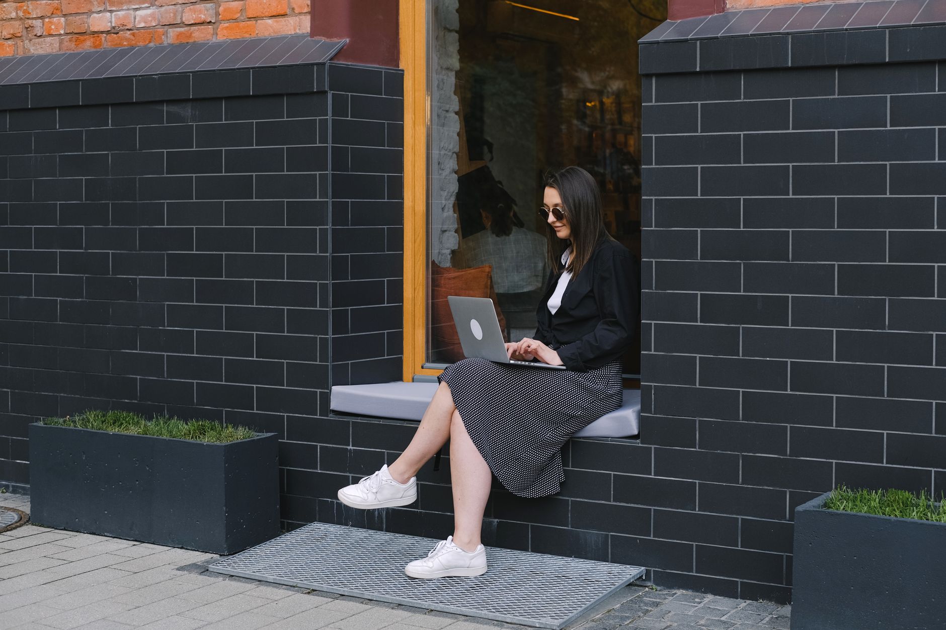 woman typing on laptop