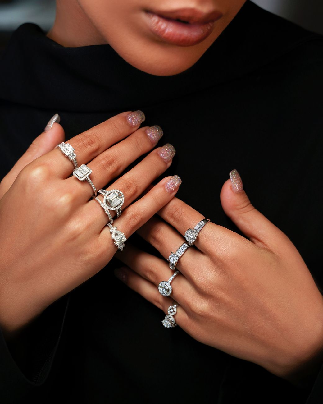 elegant woman s hands adorned with diamond rings